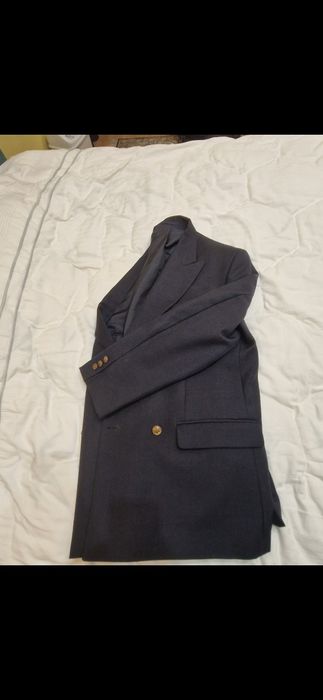 Пиджак двубортный совершенно новый.