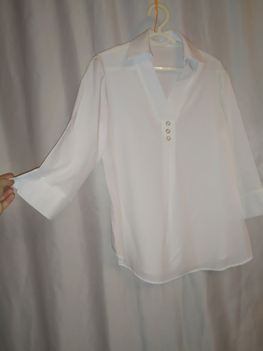 Классическая элегантная рубашка в идеальном состоянии.