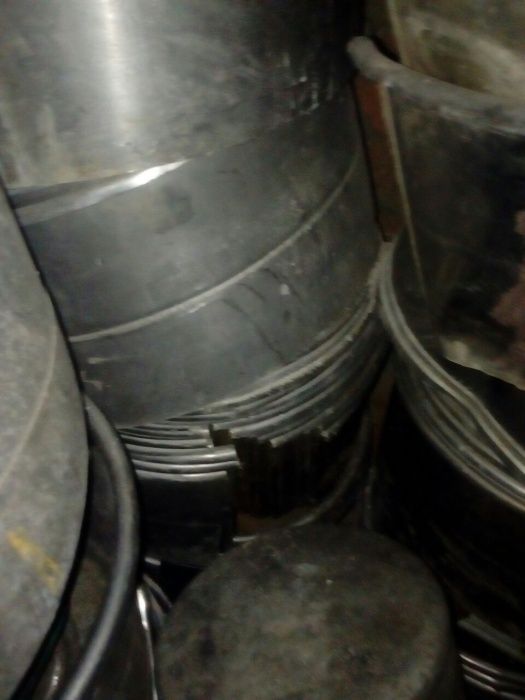 Разрезанные бочки от стиральной машины