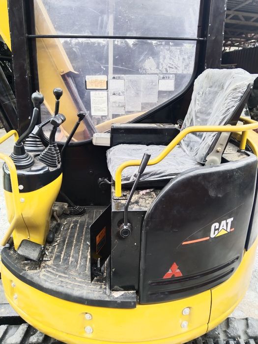 Миниэкскаватор Caterpillar