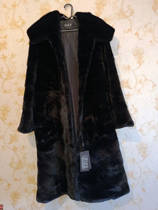 Женские одежды..