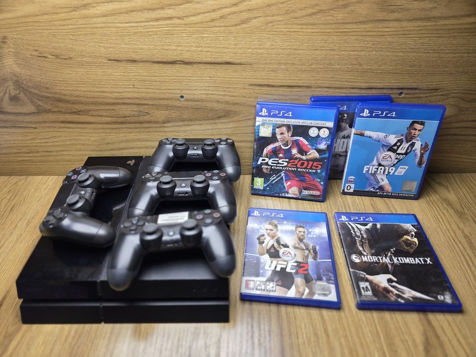 Playstation 4  1 TB 4 ta Pulti bor (Diskovodli) + 5 ta original disk