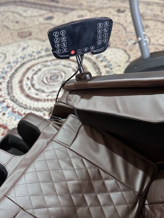 Массажный кресло