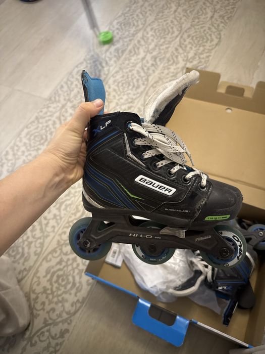 Роликовые коньки