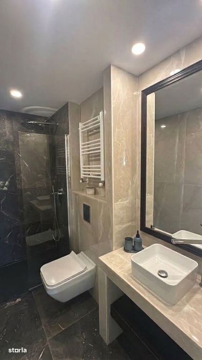 Apartament cu 4 camere si curte privata  de 139 mp