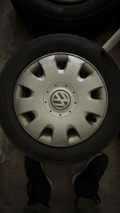 Set roti iarna Continental 195/65 R15 + Jante tabla (5x100) cu capace