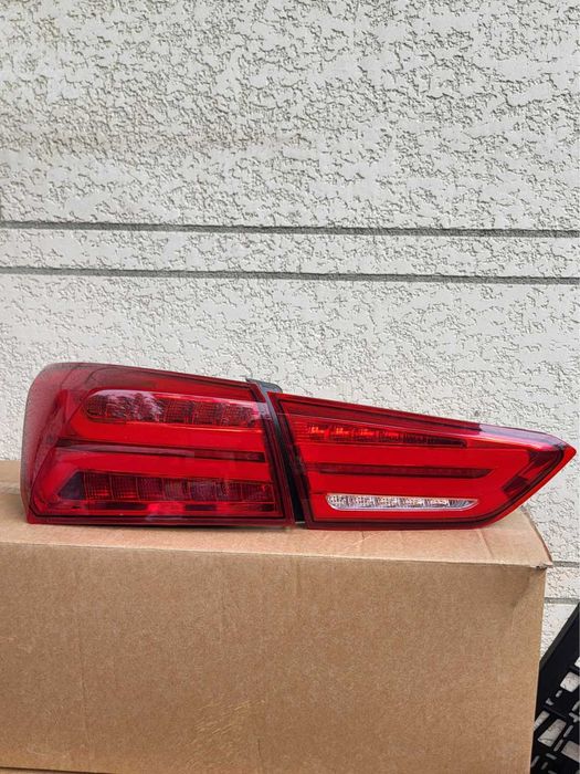 Chevrolet Malibu 2 uchun Audi uslubidagi orqa stop-faralar.