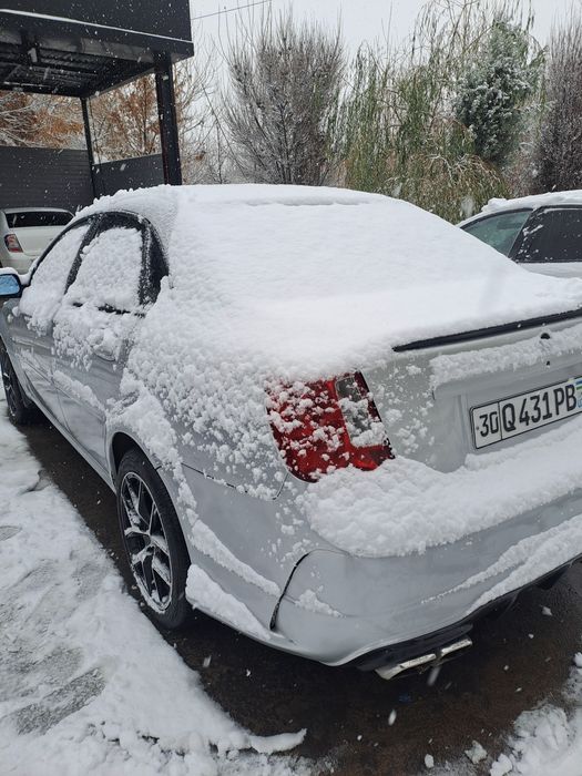 Ласетти 1.8 автомат петно