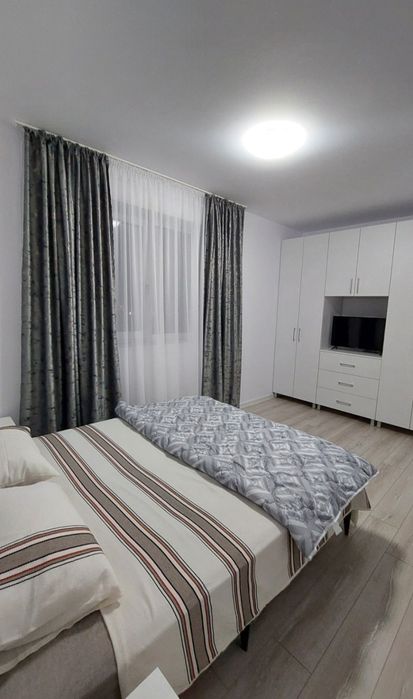 Închirieriez apartament nou cu loc de parcare!Prima închiriere!