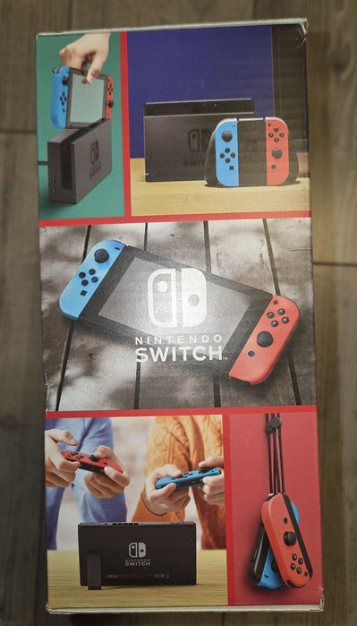 Consola Nintendo Switch cu Joy-Con neon albastru și roșu sigilat