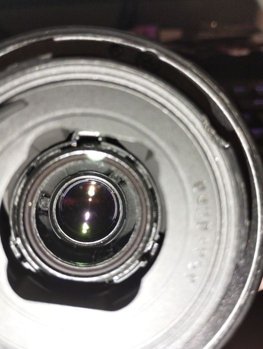 Canon EF 55-200mm f/4.5-5.6 II USM si Olympus 14-42mm f/3.5-5.6 EZ ED