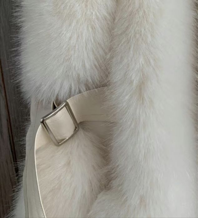 Меховая жилетка