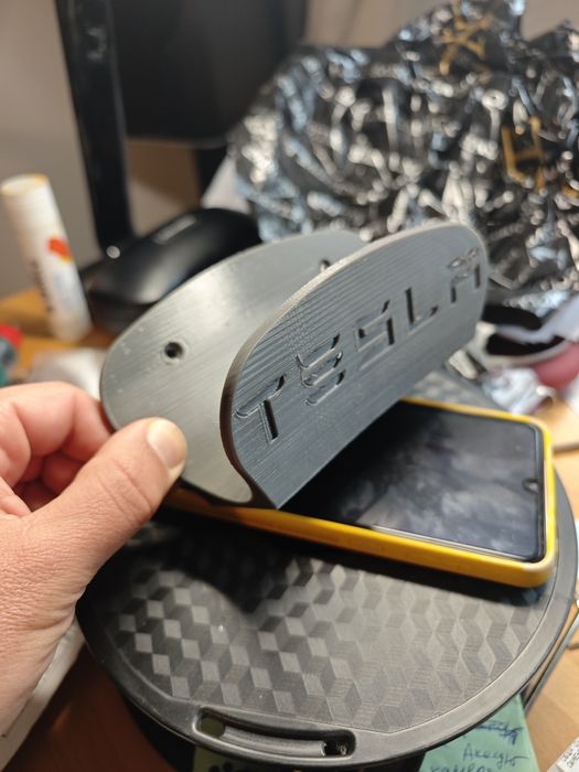 Tesla държач за кабел на зарядна станция