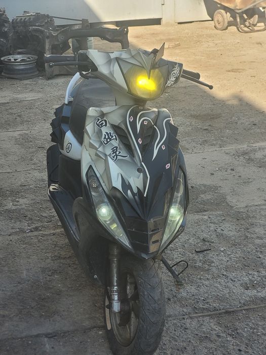 Скутер, мопед ангел