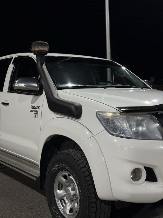 Toyota Hilux 2012 газ бензин
