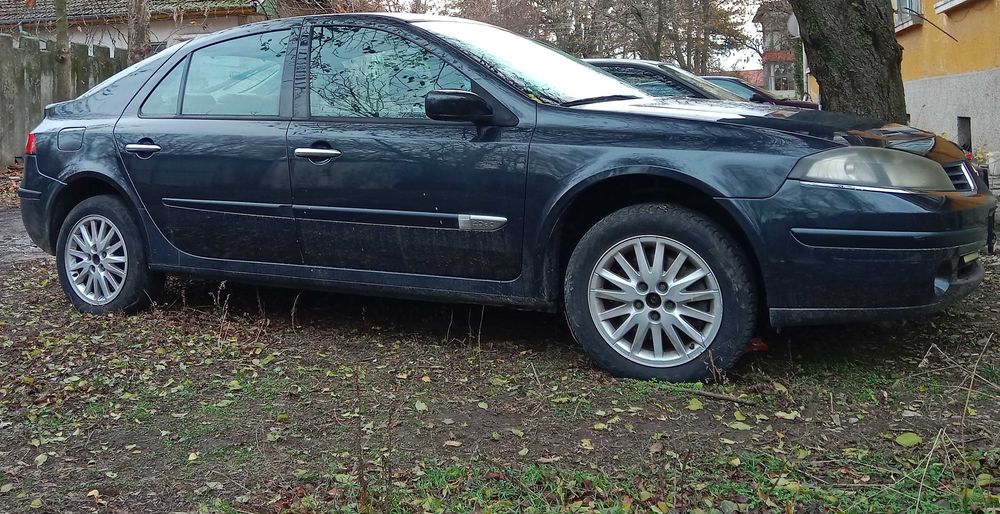 Рено Лагуна на части