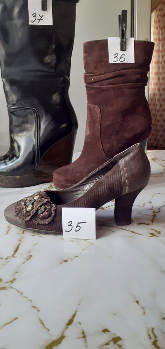 Продам женские сапоги.новые