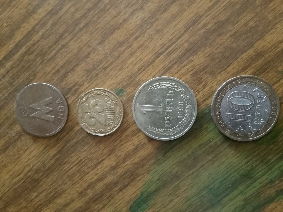 Продам манету не дорого