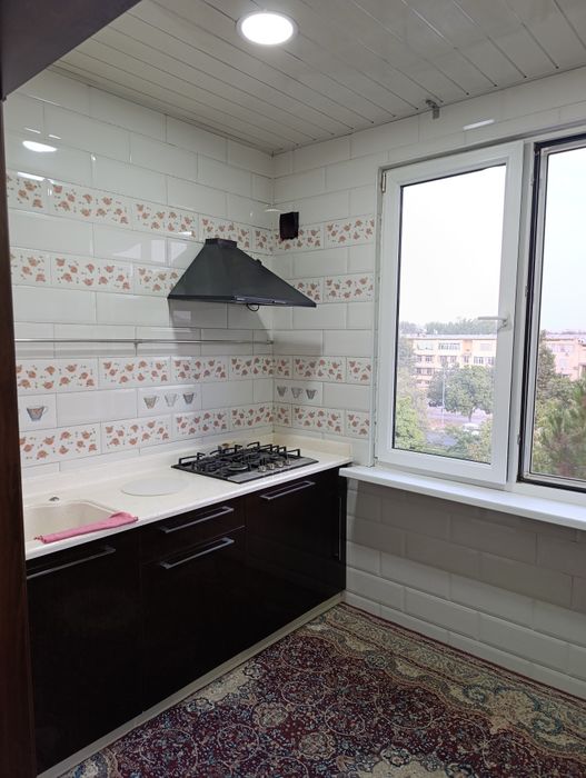 Юнусабад -19 2 х комн.передел.в трёх с обстановкой.