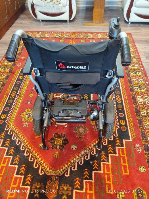 Инвалидная коляска с электроприводом