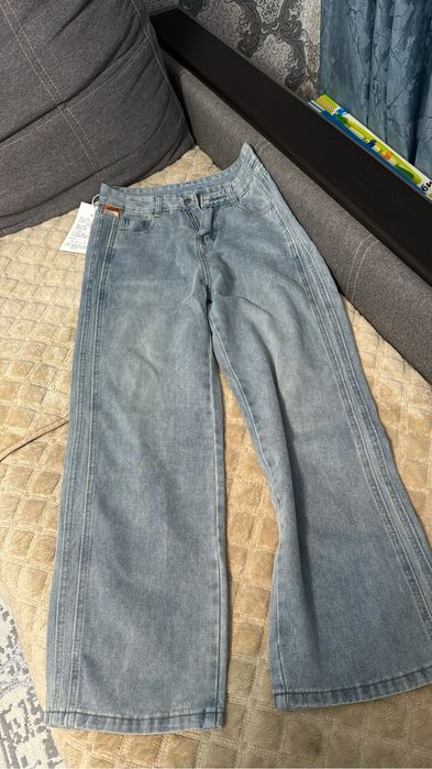 Джинсы клеш