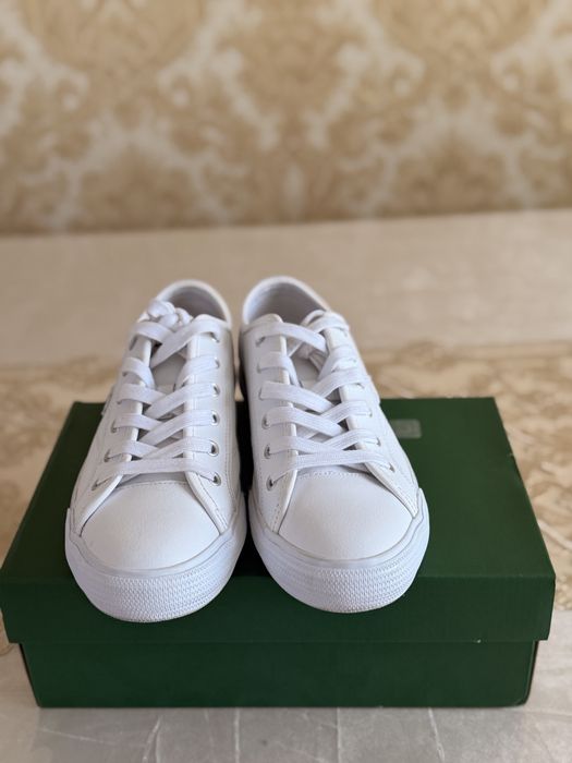 Белые кеды Lacoste
