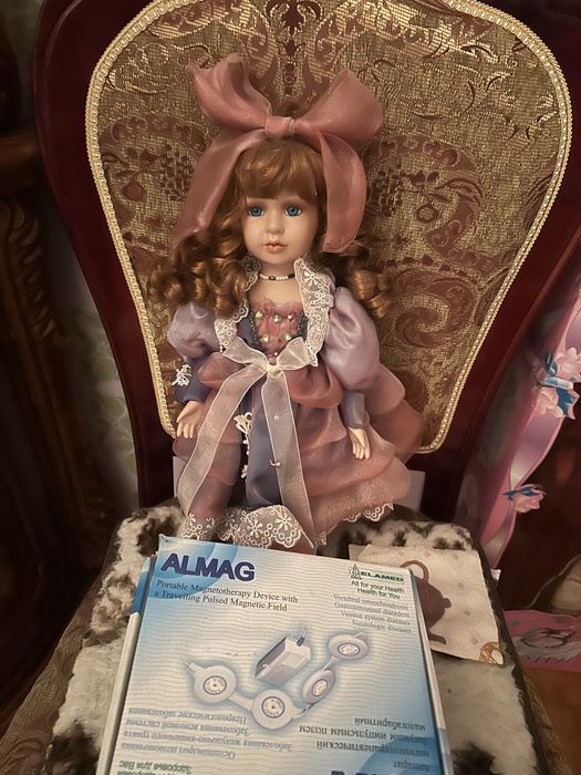 Куклы фарфоровые(коллекционные)