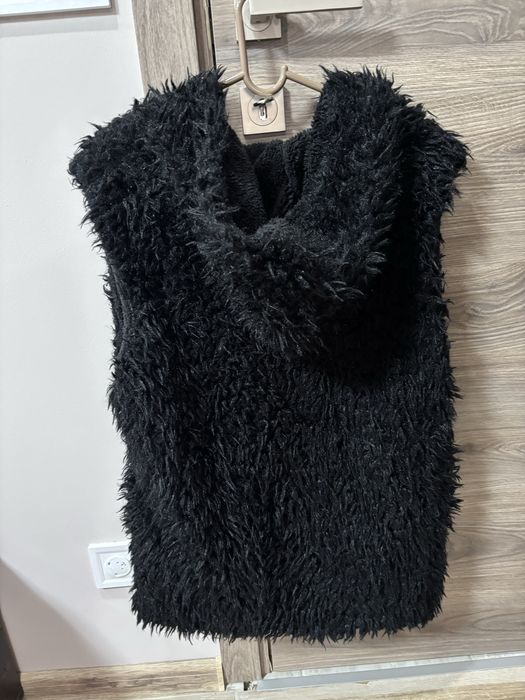 Пухен елек.