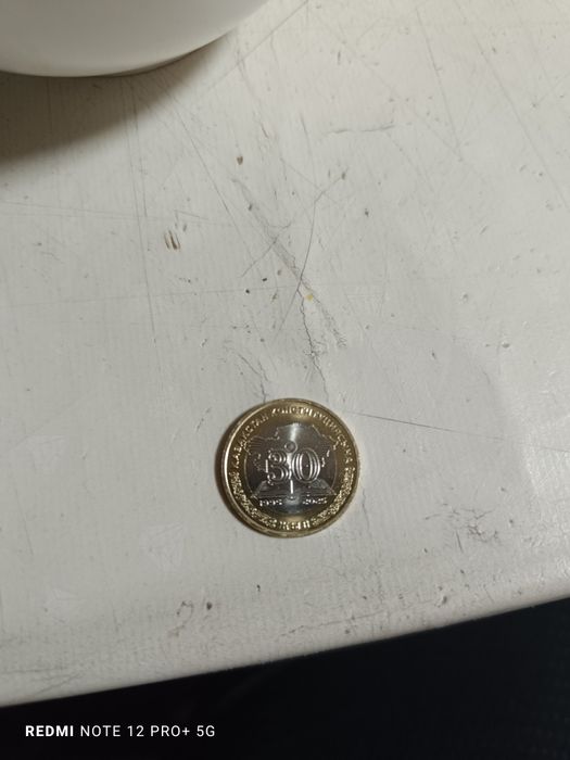 Монета 100 теңге