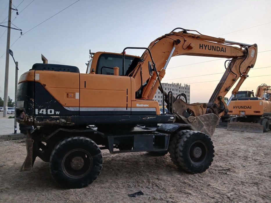 Экскаватор хундай 140