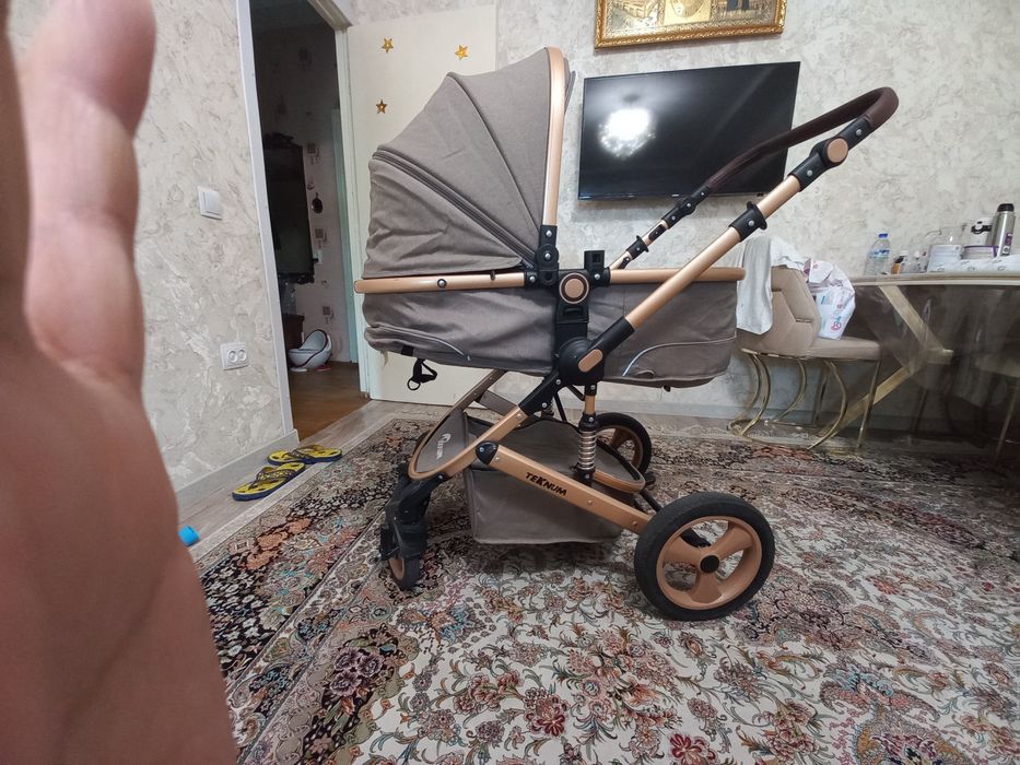 Коляска для малышейTeknum