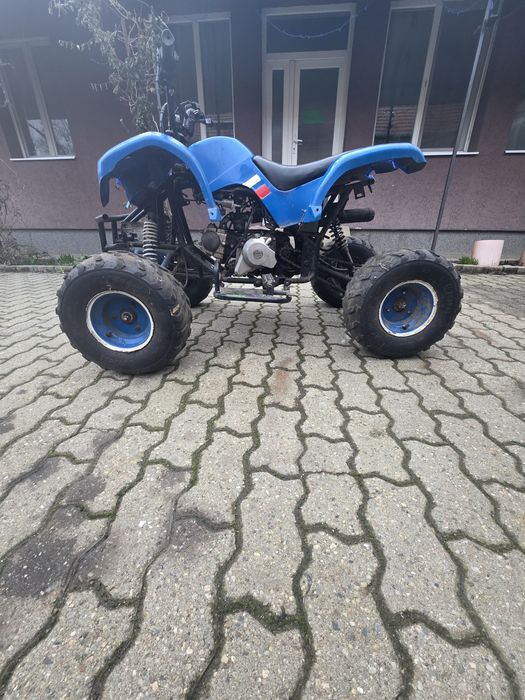 Vând atv 125 cm³