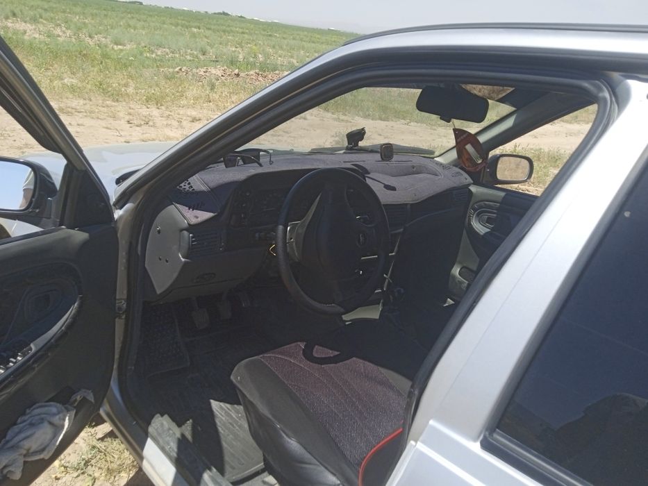 Neksiya sons lyuks konditsioner 2003