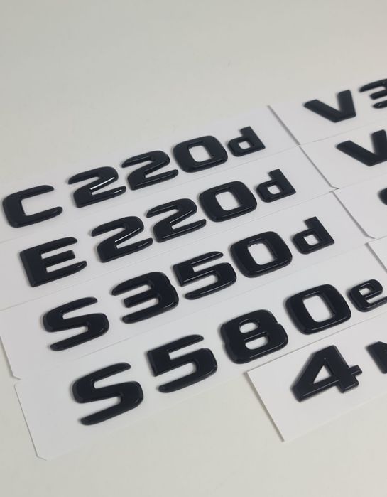 Pachet-Set-Motorizare-Spate-Haion-Mercedes+Emblema-4Matic-Crom-Negru-Lucios-C220d-E200d-E220d-GLC220d-CLS350d-CLS400d-E300d-GLE350d-GLE400d-S500-S580e