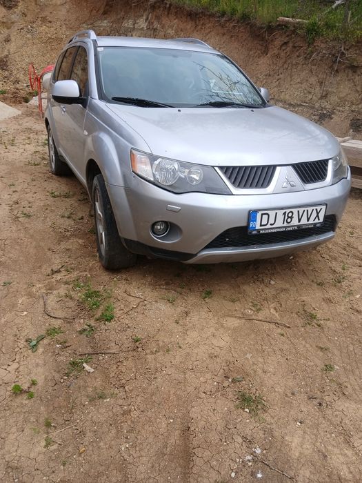 Vind Mitsubishi  Qulender An fab 2008 Amotor 2000 cm Geamuri electrice  ac  4x4.