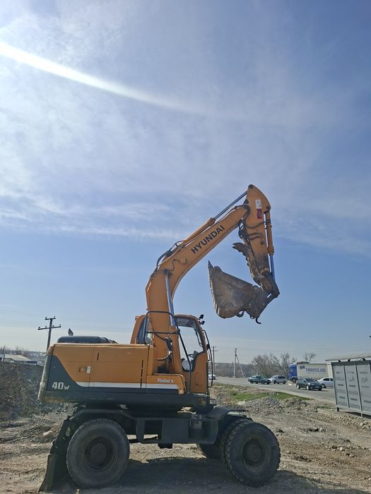 Услуги 140 145+ колеснои экскаватор