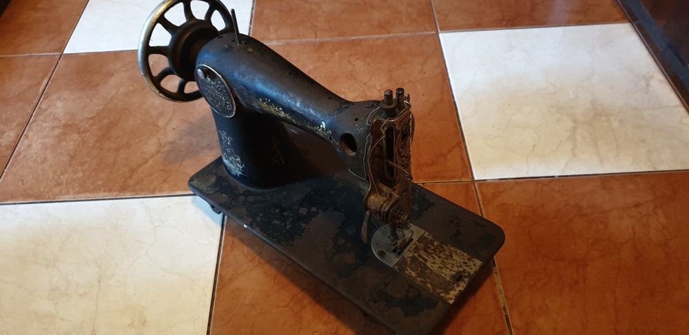 Mașină de cusut Singer