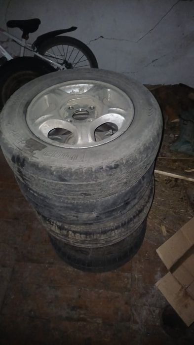 Продам 5 титанок с летней резиной