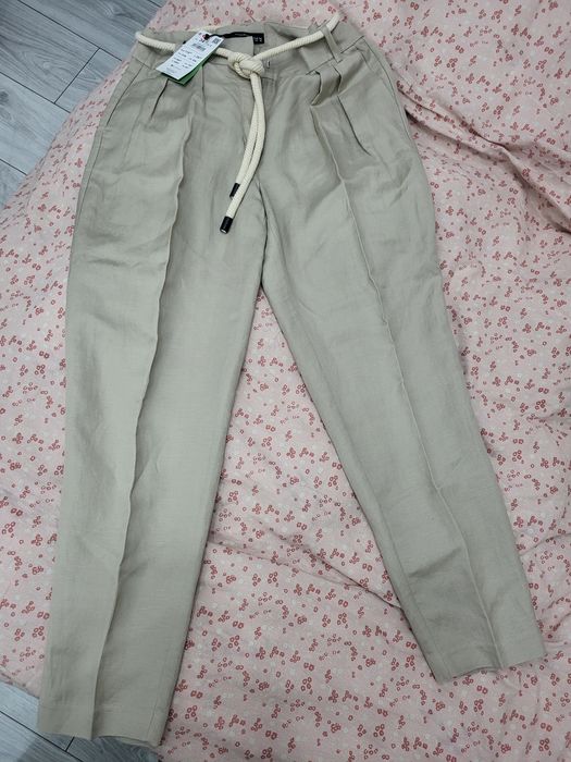 Pantaloni din in noi cu etichetă