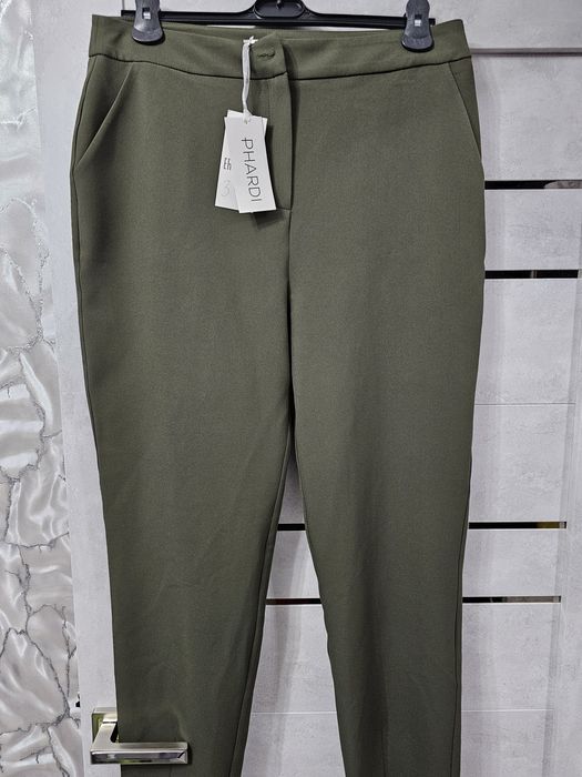 Новые женские брюки 42(+6)