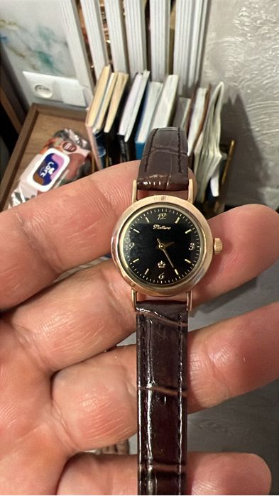 Продам золотые часы