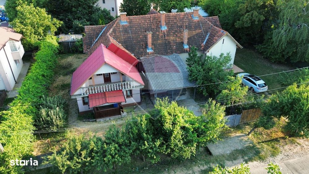 Casă centru Gugesti