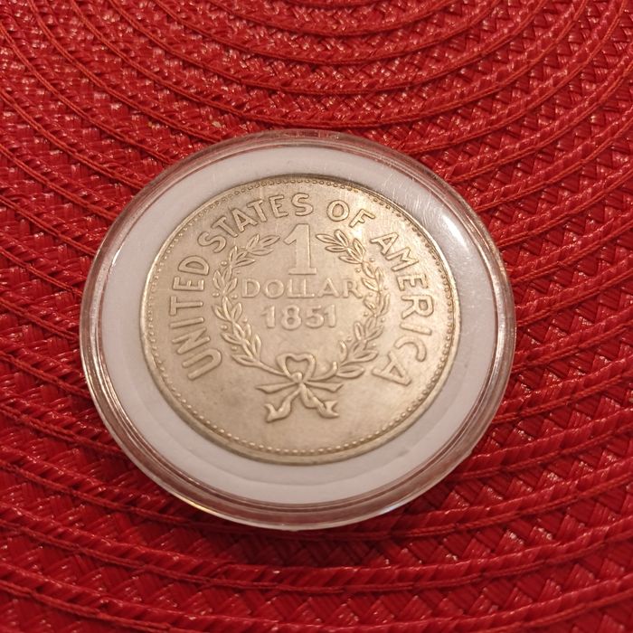 Moneda de un dolar 1851