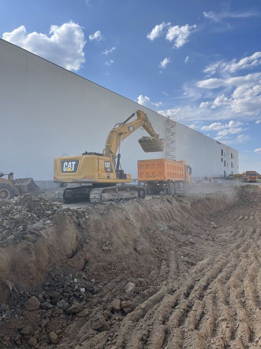 Разработка котлована, выемка грунта