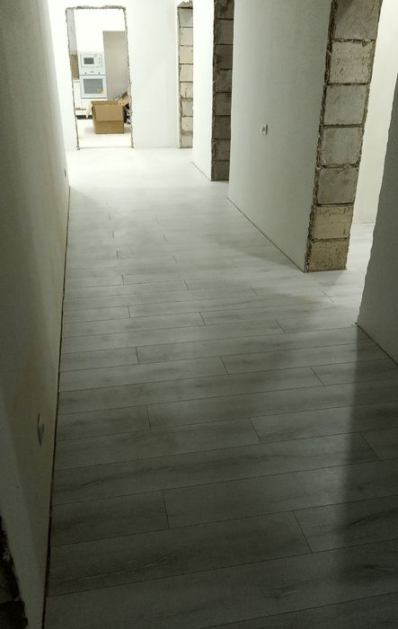 Укладка ламината,линолеума,плинтуса