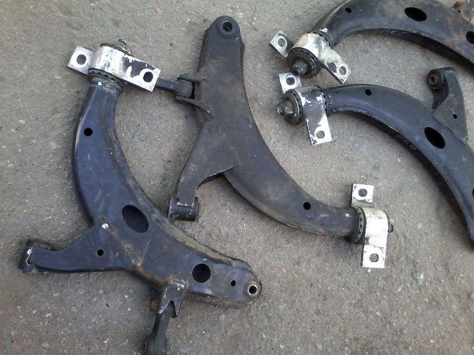 Передние рычаги на субару