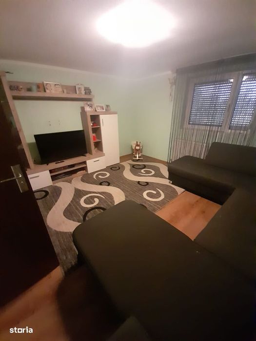 Casă cu 4 camere și curte spațioasă