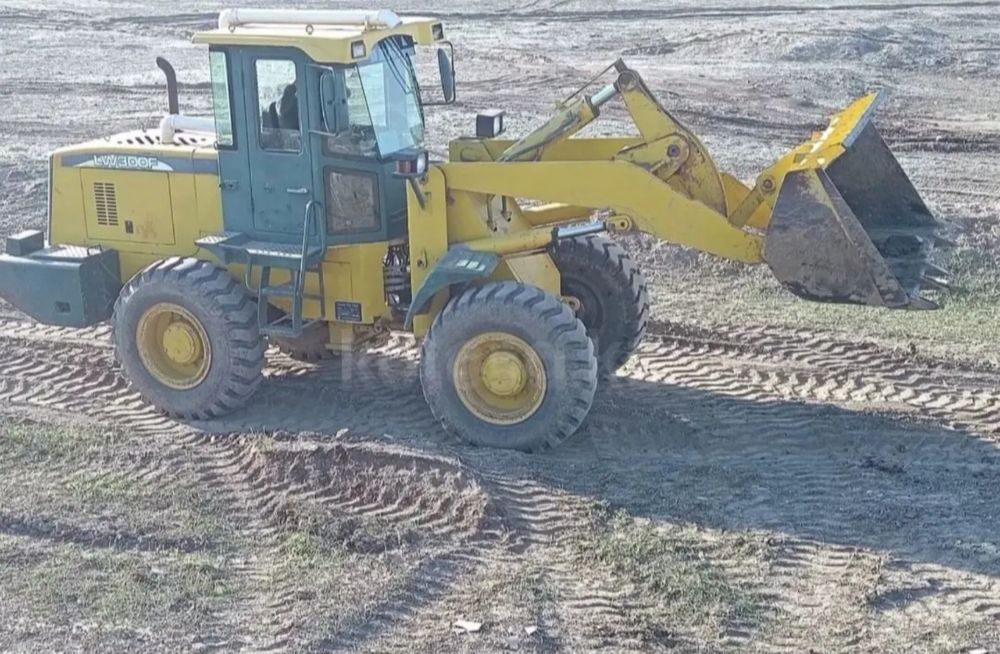 Погрузщик фронтальный