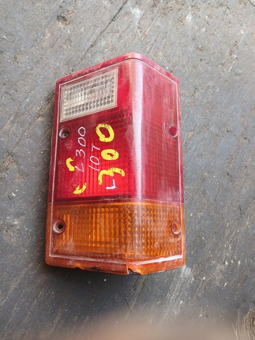 Фонарь Митсубиси L300 левый