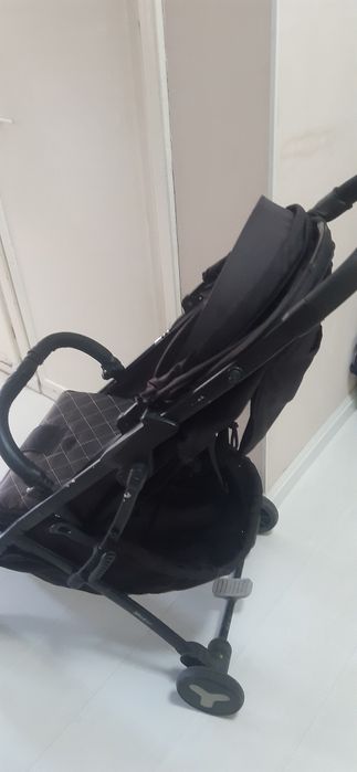 Коляска мстар чёрного цвета